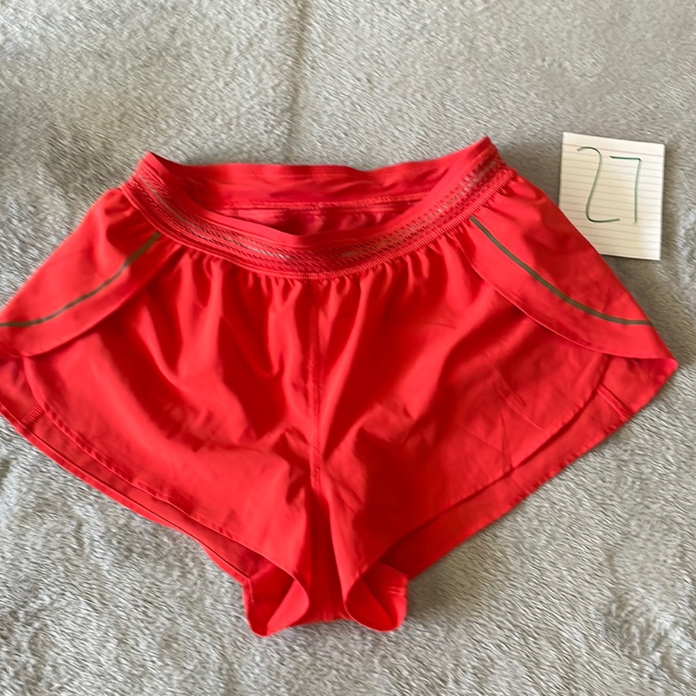 Lululemon split shorts coral color sz 4 inseam 2 in  liner intact